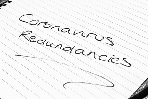 Coronavirus redundancies written on a piece of paper 