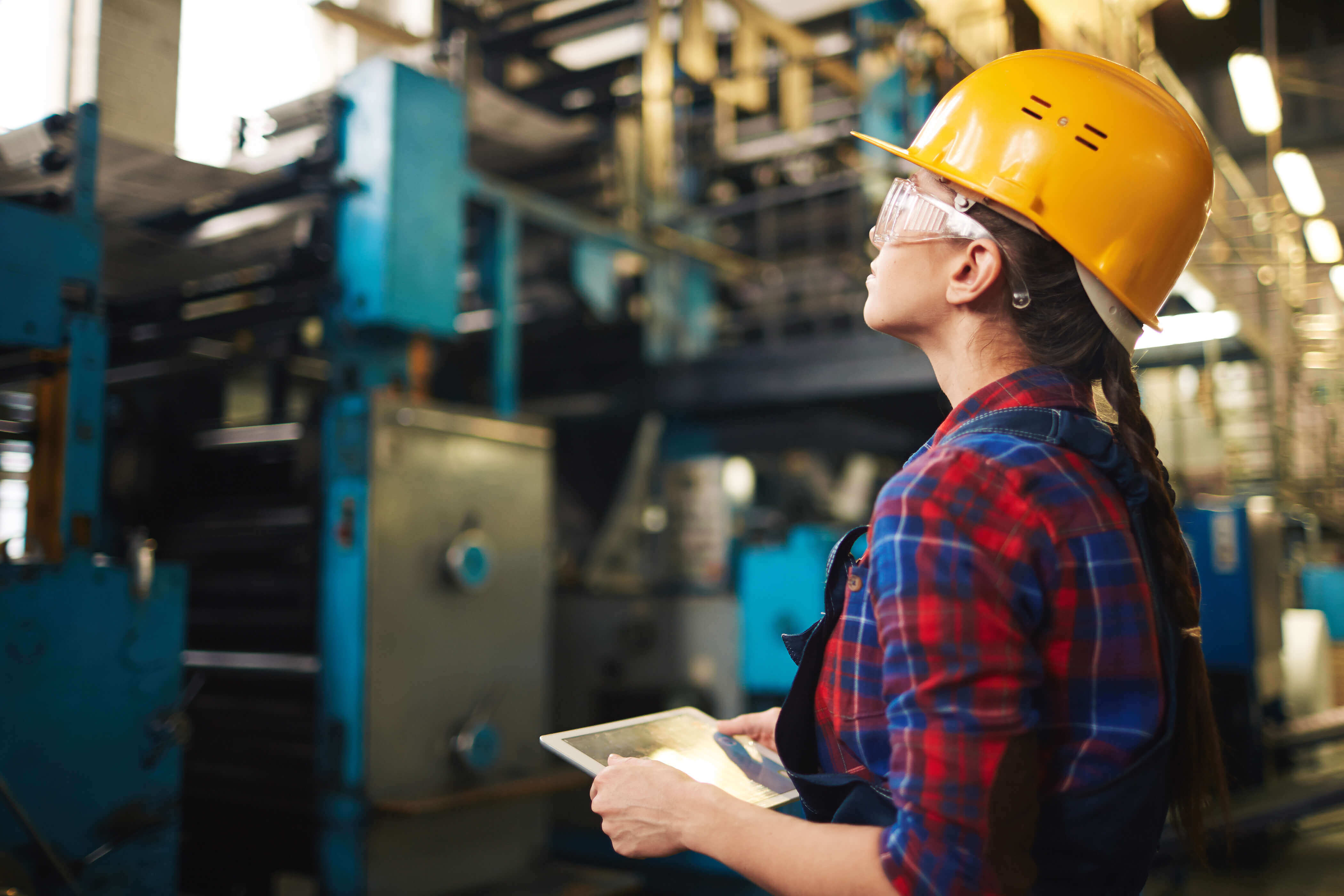 women in hard hat working 