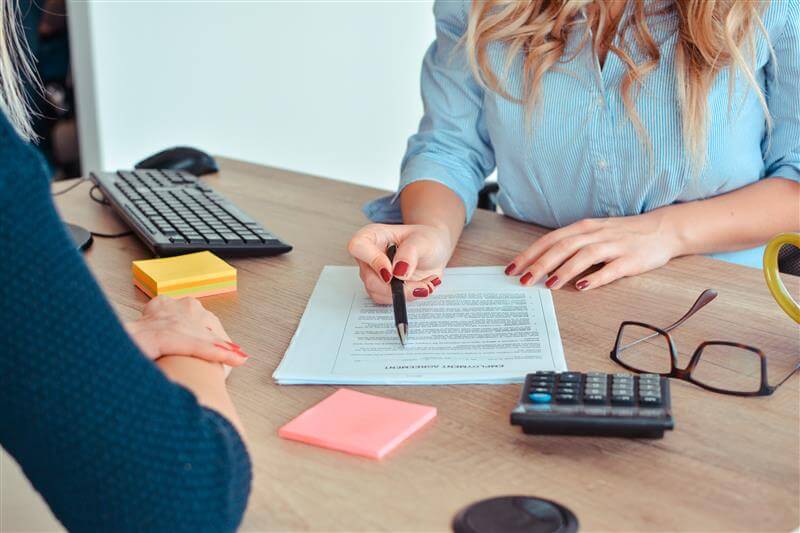 women reviewing documents